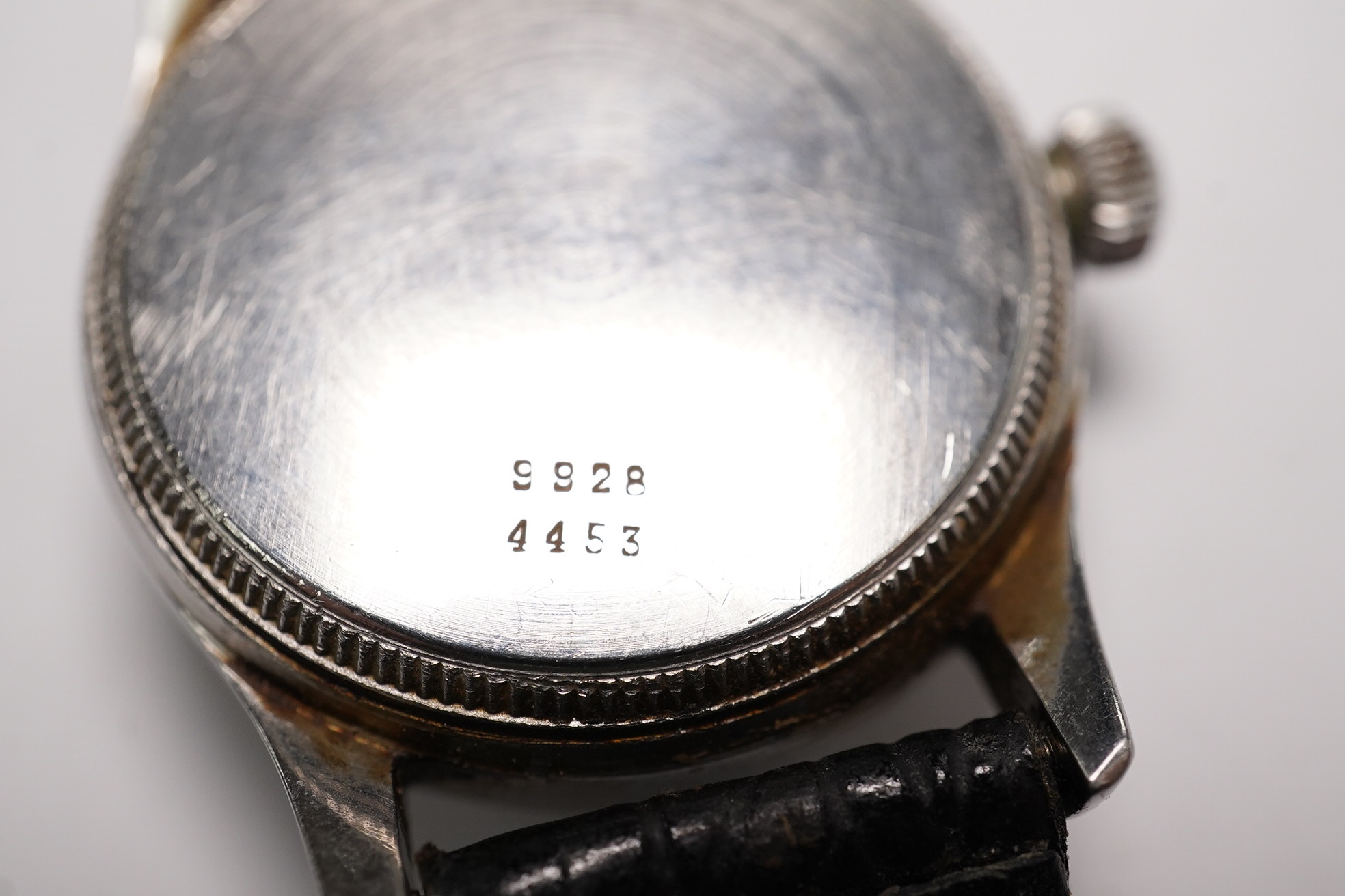 A stainless steel Tudor Oyster manual wind wrist watch, on an associated strap, case diameter 31mm. Condition - poor to fair